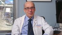 Byron Thomashow, MD, meets with a patient